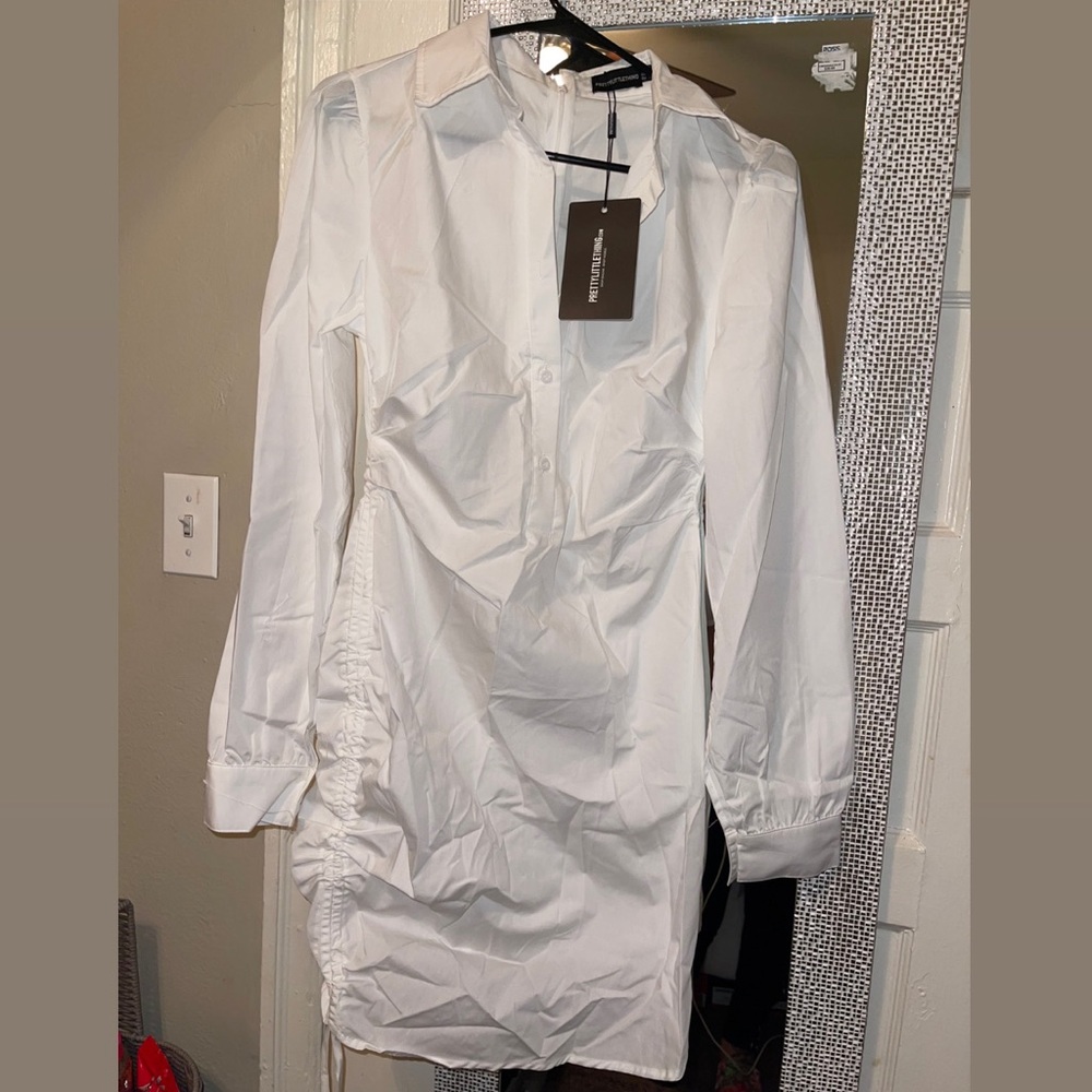 Brand new fitted shirt dress from pretty little thing.
